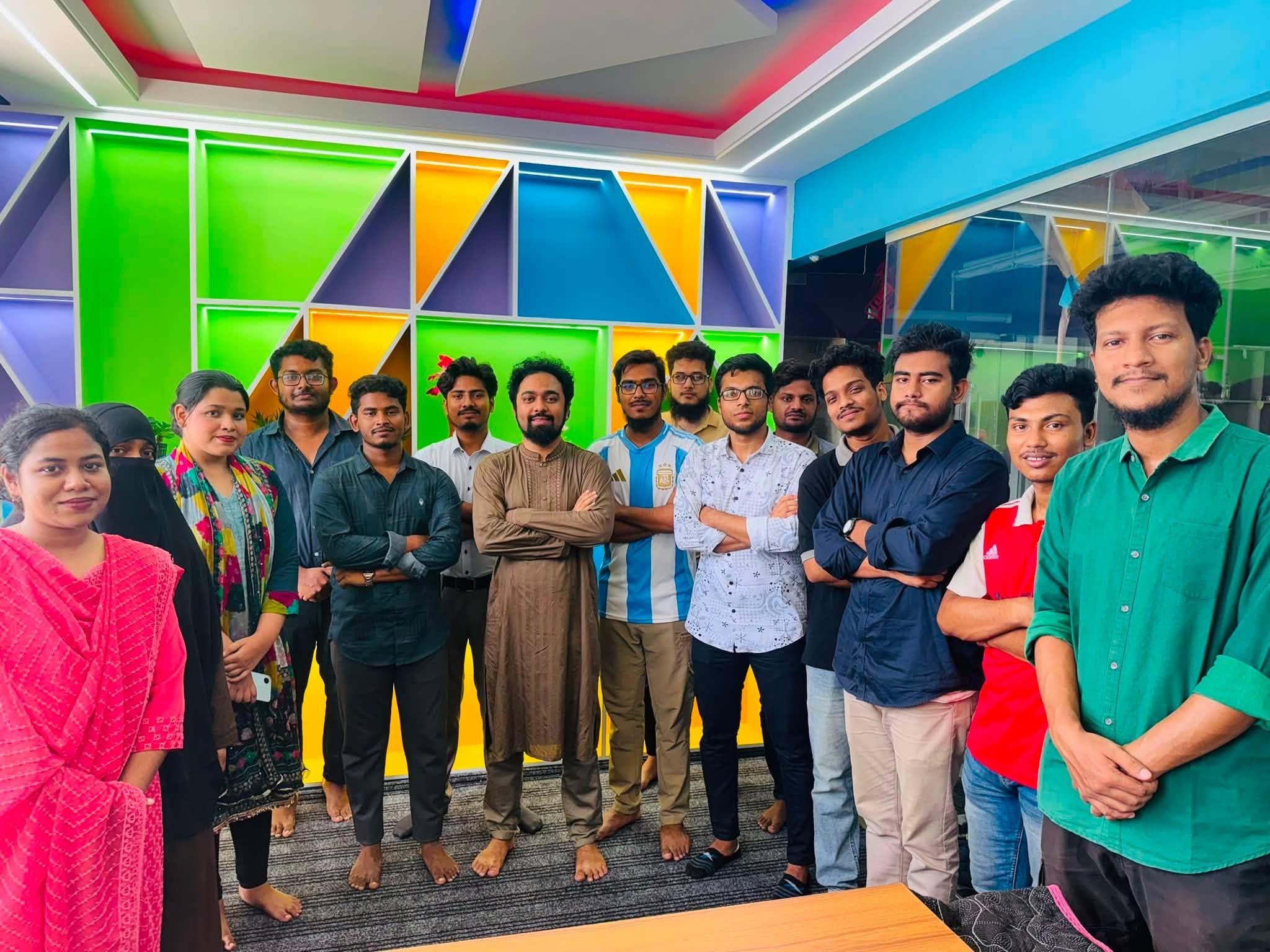 The team together in the studio